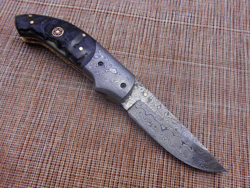 7.5" Folding Knife, 3.5" Hand Forged Twist Pattern Damascus Steel Blade Pocket Knife, 4" scale available in 3 Colors, Liner Lock & Thumb knob Equipped, Cow Hide Leather Sheath