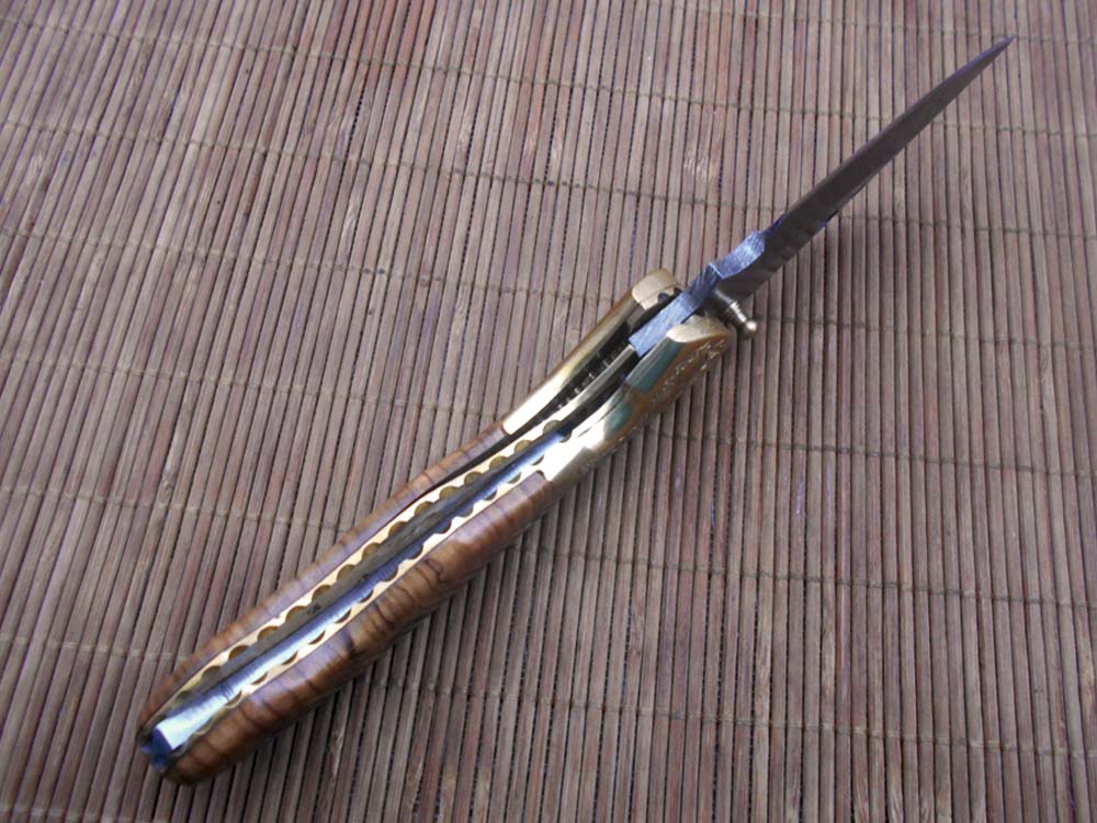 7.5" Folding Knife, 3.5" Hand Forged Twist Pattern Damascus Steel Blade with 3 Holes, Available in 3 Scale colors Pocket Knife, Liner Lock & Thumb knob Equipped, Cow Hide Leather Sheath included