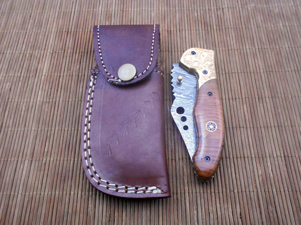 7.5" Folding Knife, 3.5" Hand Forged Twist Pattern Damascus Steel Blade with 3 Holes, Available in 3 Scale colors Pocket Knife, Liner Lock & Thumb knob Equipped, Cow Hide Leather Sheath included