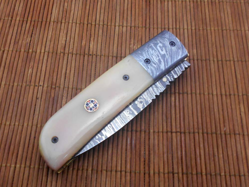 7.75" Damascus steel folding knife, liner lock, thumb knob, Cow sheath