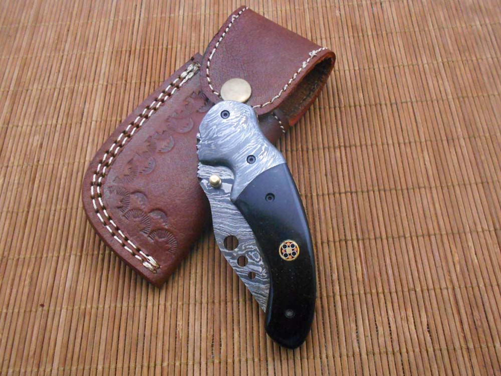 7.5" Folding Knife, 3.5" Hand Forged Twist Pattern Damascus Steel Blade with 3 Holes, Available in 3 Scale colors Pocket Knife, Liner Lock & Thumb knob Equipped, Cow Hide Leather Sheath included
