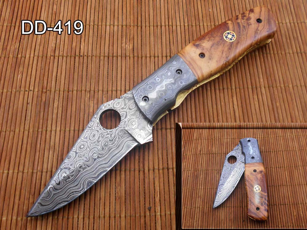 7.5" flat scale folding knife, Damascus steel blade with finger hole, Equipped with liner lock, Available in Wood & Horn scales, Leather sheath included