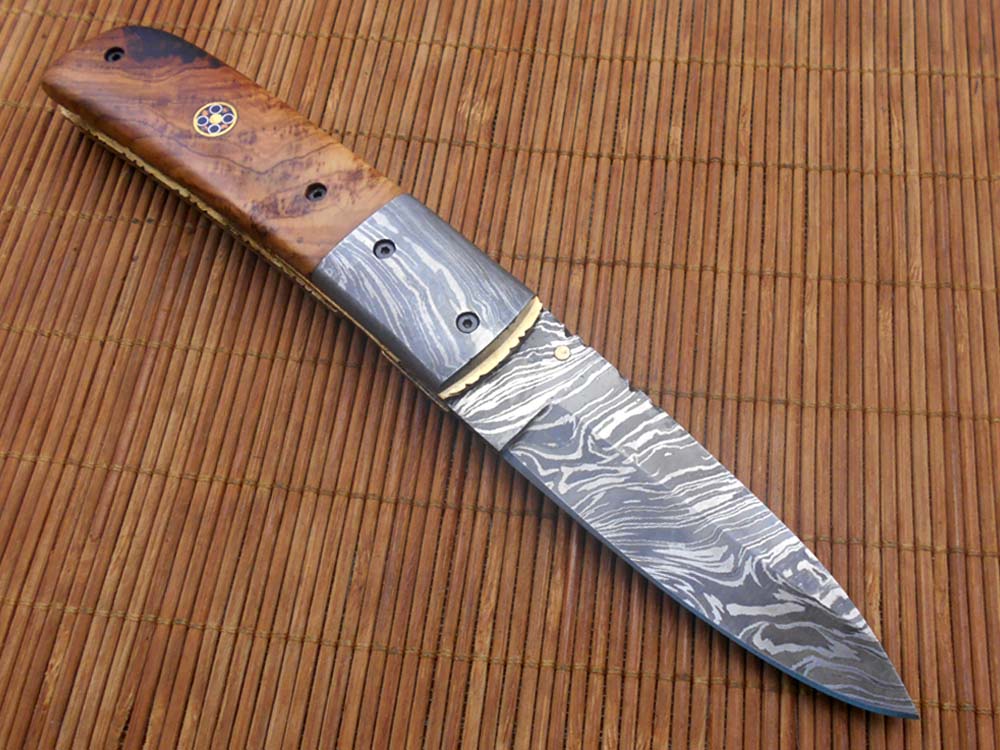 7.75" Damascus steel folding knife, liner lock, thumb knob, Cow sheath