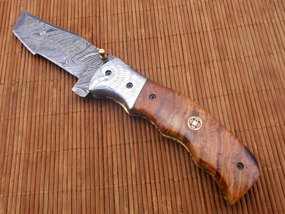 Folding knife Tracker blade knife with Engraved bird on steel bolster, 8" Hand forged Damascus steel, Available in 3 scales, Equipped with Brass Liner lock, Cow hide Leather sheath with belt loop