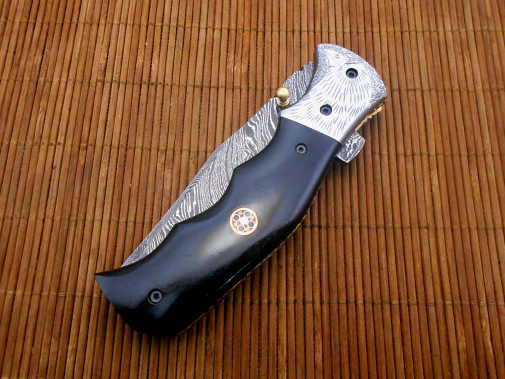 Folding knife Tracker blade knife with Engraved bird on steel bolster, 8" Hand forged Damascus steel, Available in 3 scales, Equipped with Brass Liner lock, Cow hide Leather sheath with belt loop
