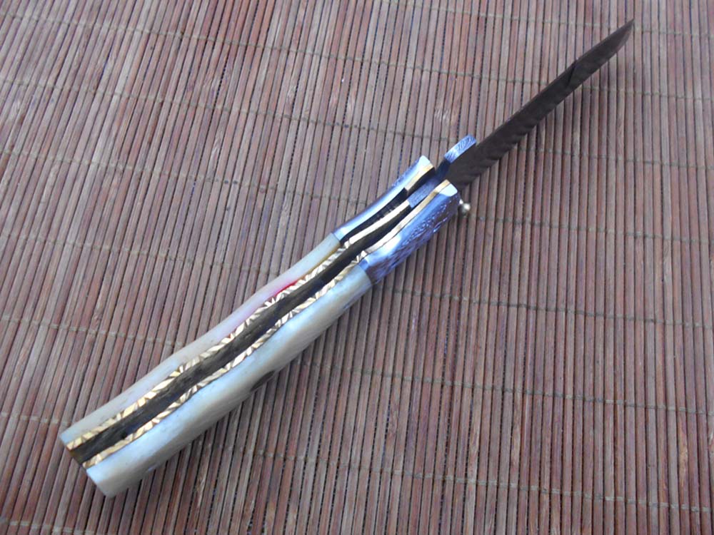 Folding knife Tracker blade knife with Engraved bird on steel bolster, 8" Hand forged Damascus steel, Available in 3 scales, Equipped with Brass Liner lock, Cow hide Leather sheath with belt loop