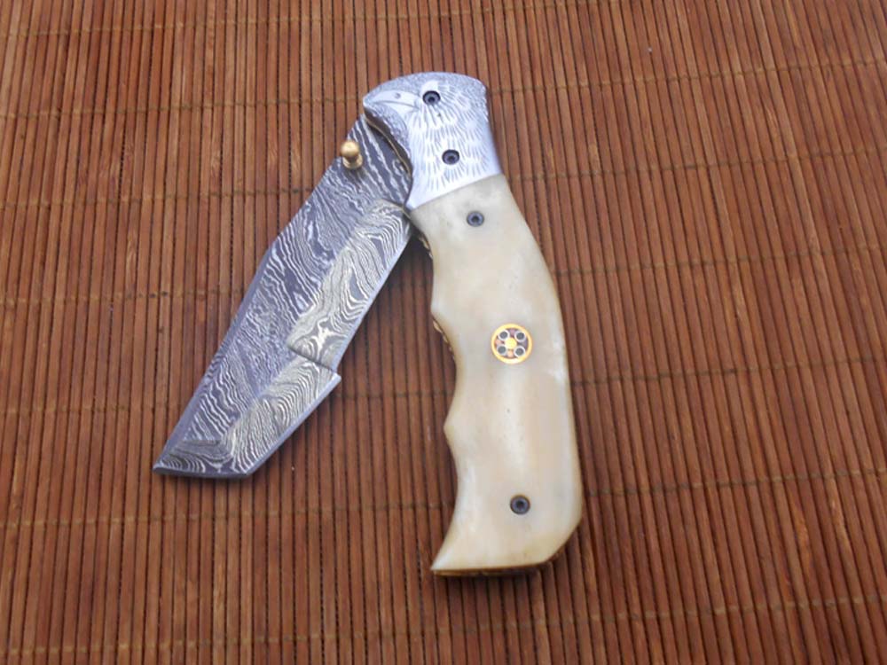 Folding knife Tracker blade knife with Engraved bird on steel bolster, 8" Hand forged Damascus steel, Available in 3 scales, Equipped with Brass Liner lock, Cow hide Leather sheath with belt loop
