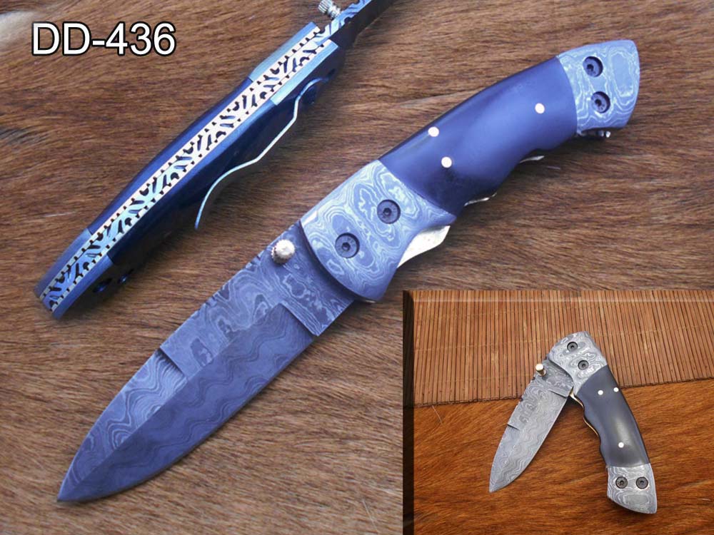 7.5" Damascus folding knife with Damascus bolster on both edges with thumb knob & liner lock equipped, Available in 4 scales, Cow hide leather sheath with belt loop included