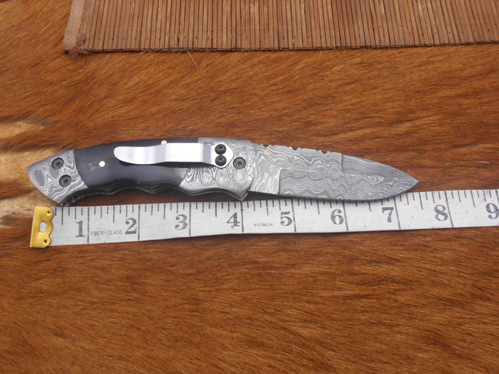 7.5" Damascus folding knife with Damascus bolster on both edges with thumb knob & liner lock equipped, Available in 4 scales, Cow hide leather sheath with belt loop included