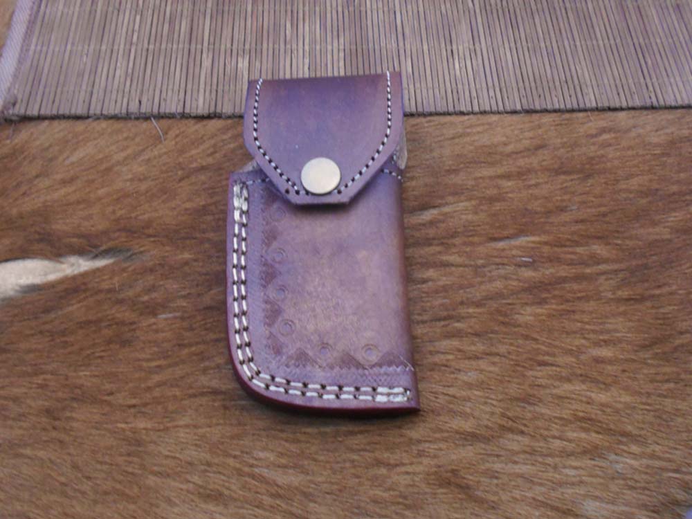 7.5" Damascus folding knife with Damascus bolster on both edges with thumb knob & liner lock equipped, Available in 4 scales, Cow hide leather sheath with belt loop included