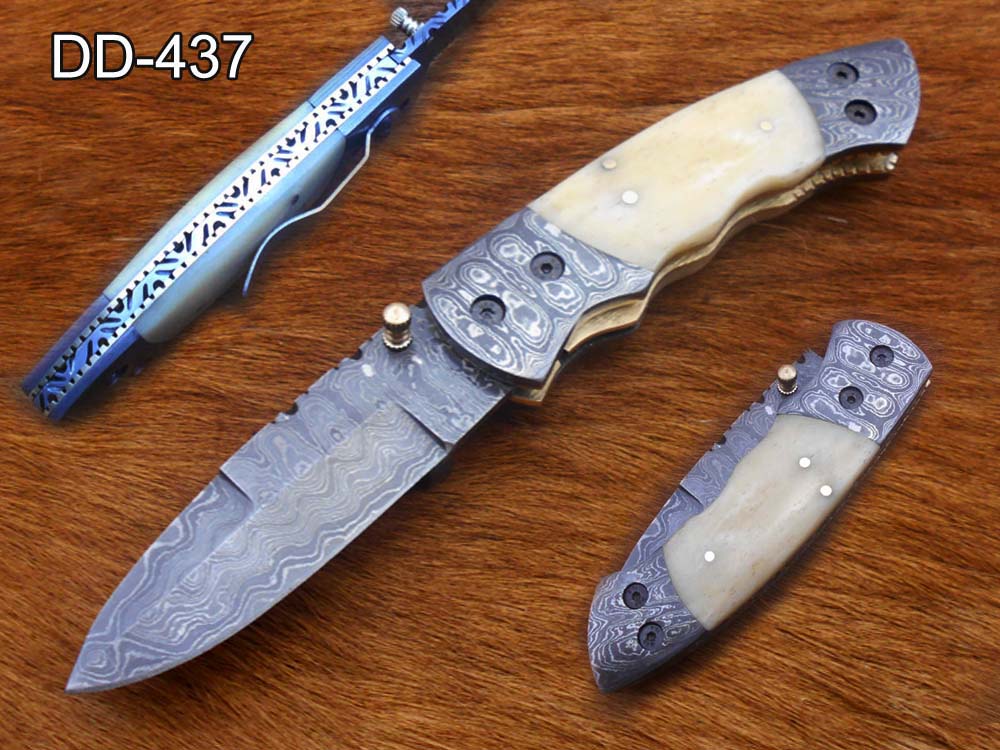 7.5" Damascus folding knife with Damascus bolster on both edges with thumb knob & liner lock equipped, Available in 4 scales, Cow hide leather sheath with belt loop included
