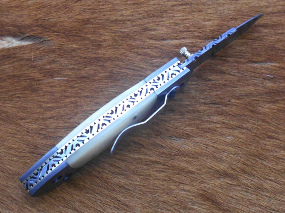 7.5" Damascus folding knife with Damascus bolster on both edges with thumb knob & liner lock equipped, Available in 4 scales, Cow hide leather sheath with belt loop included