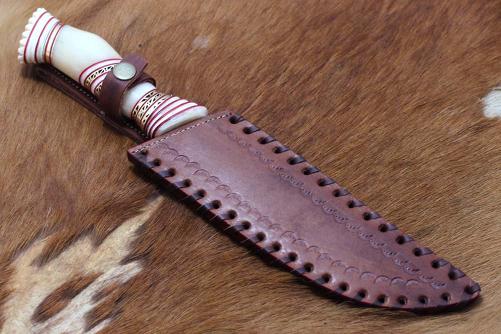 13" Long hand forged Damascus steel skinning knife, Hand carved scale crafted with engraved brass spacer, Available in Camel bone, Walnut wood and bull horn scales, Includes Cow Leather sheath