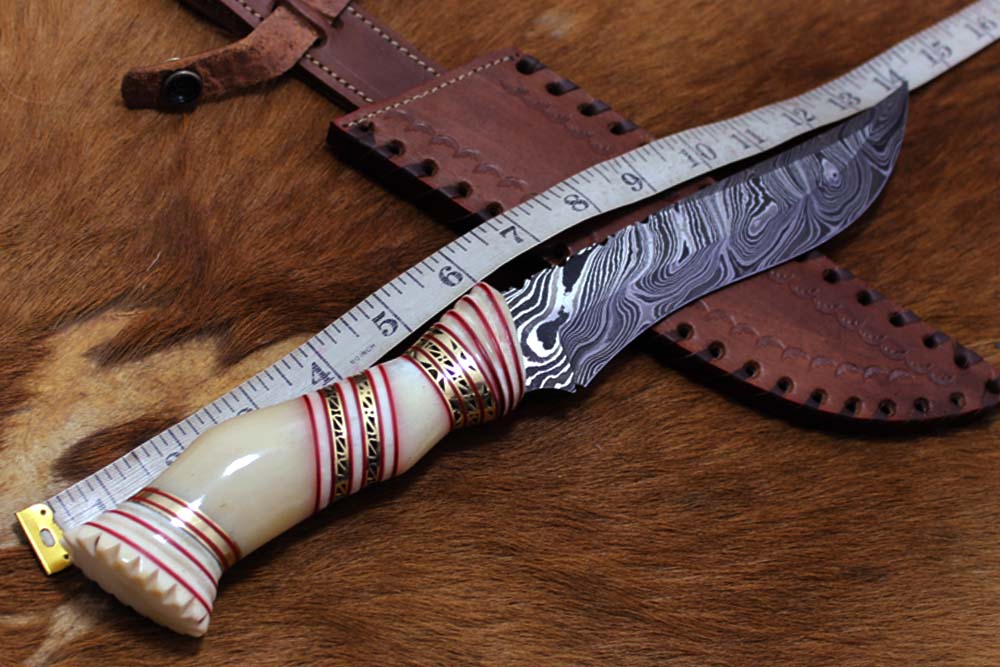 13" Long hand forged Damascus steel skinning knife, Hand carved scale crafted with engraved brass spacer, Available in Camel bone, Walnut wood and bull horn scales, Includes Cow Leather sheath