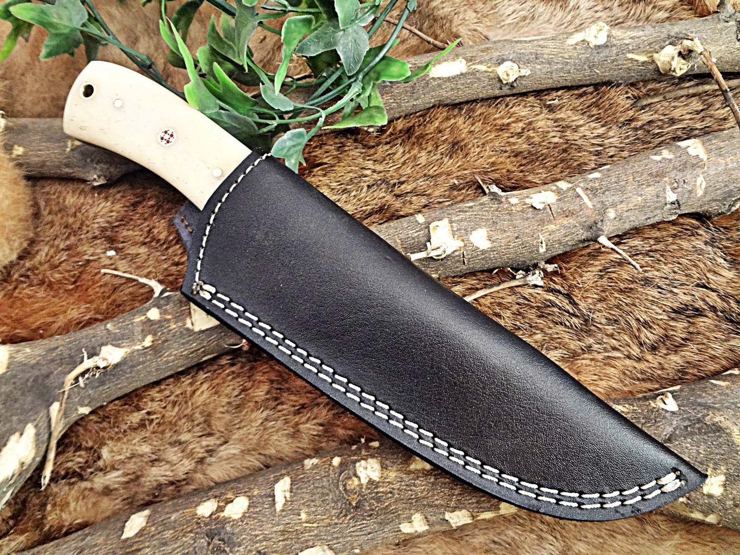 9" Damascus steel full tang Skinning Knife, Black and white scales with Brass Bolster scale, Cow hide Leather sheath included