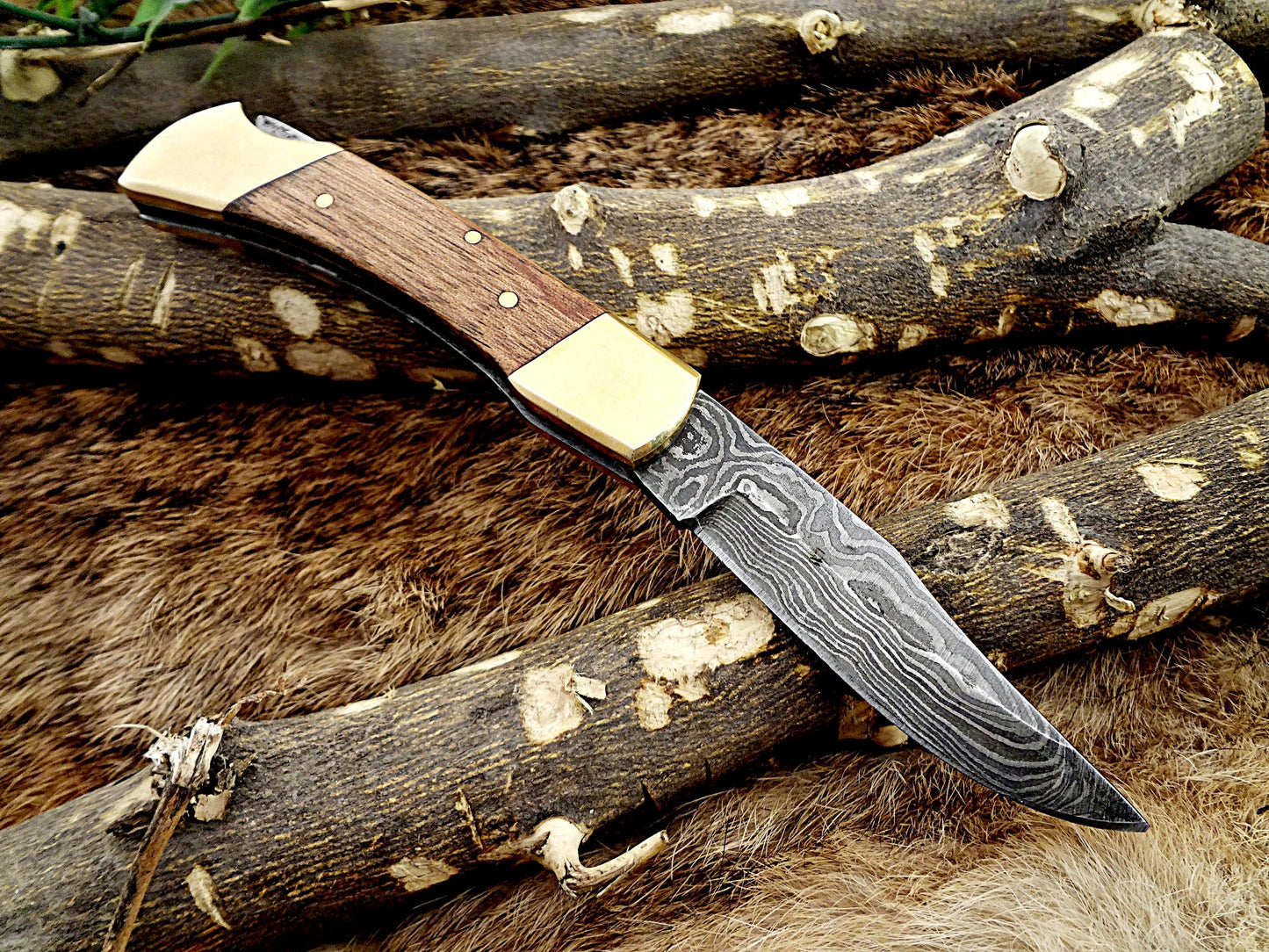 7.5" back liver lock Folding Knife, Hand forged Damascus steel blade, Available in wood, Bone and Horn scales bolster, Comes with cow hide leather sheath