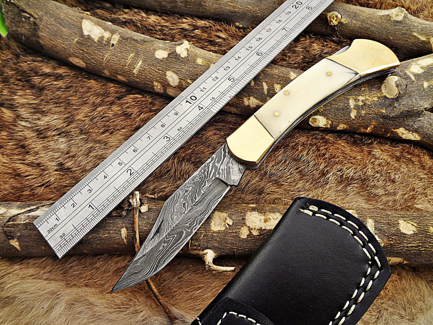 7.5" back liver lock Folding Knife, Hand forged Damascus steel blade, Available in wood, Bone and Horn scales bolster, Comes with cow hide leather sheath