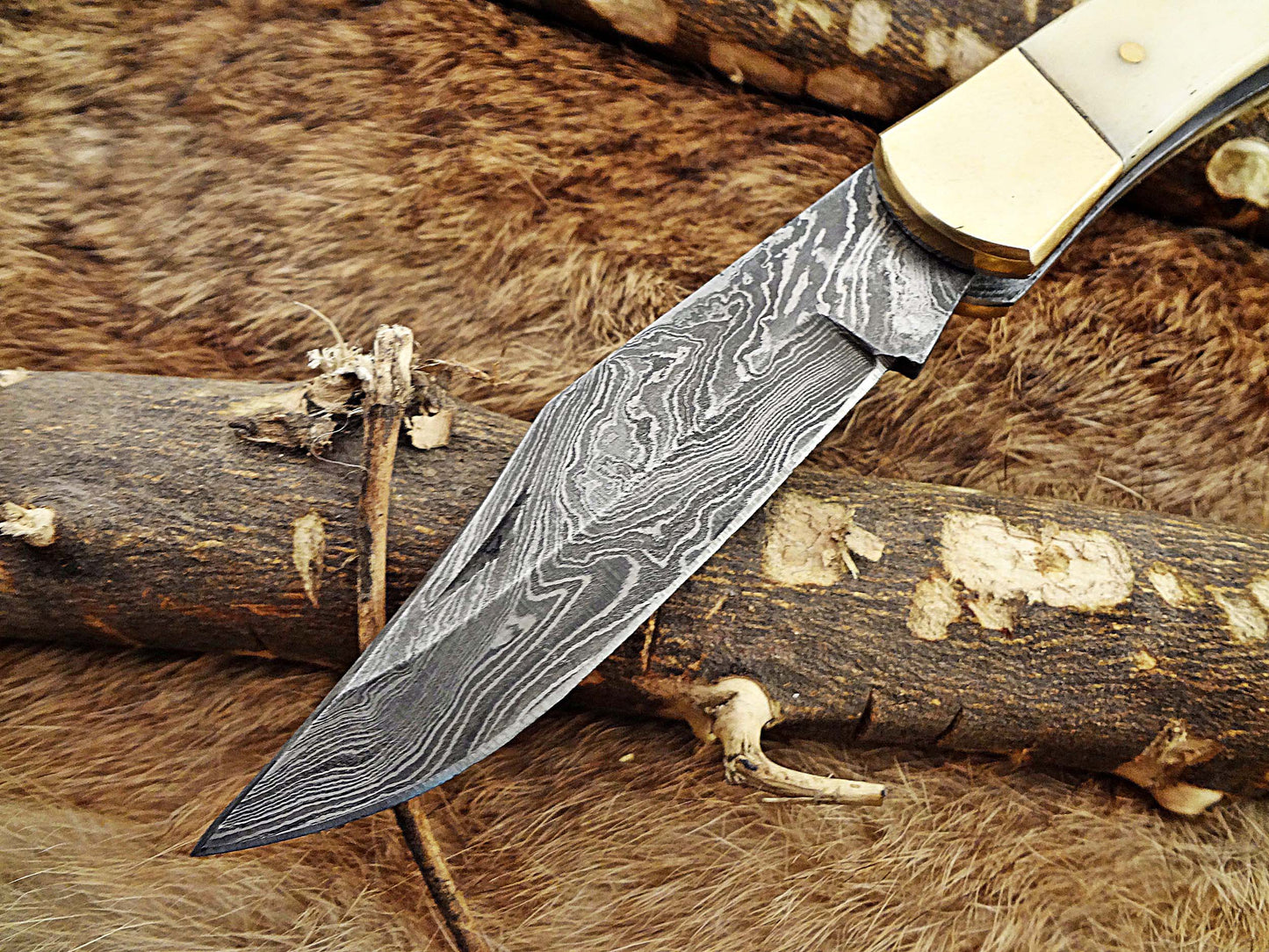 7.5" back liver lock Folding Knife, Hand forged Damascus steel blade, Available in wood, Bone and Horn scales bolster, Comes with cow hide leather sheath
