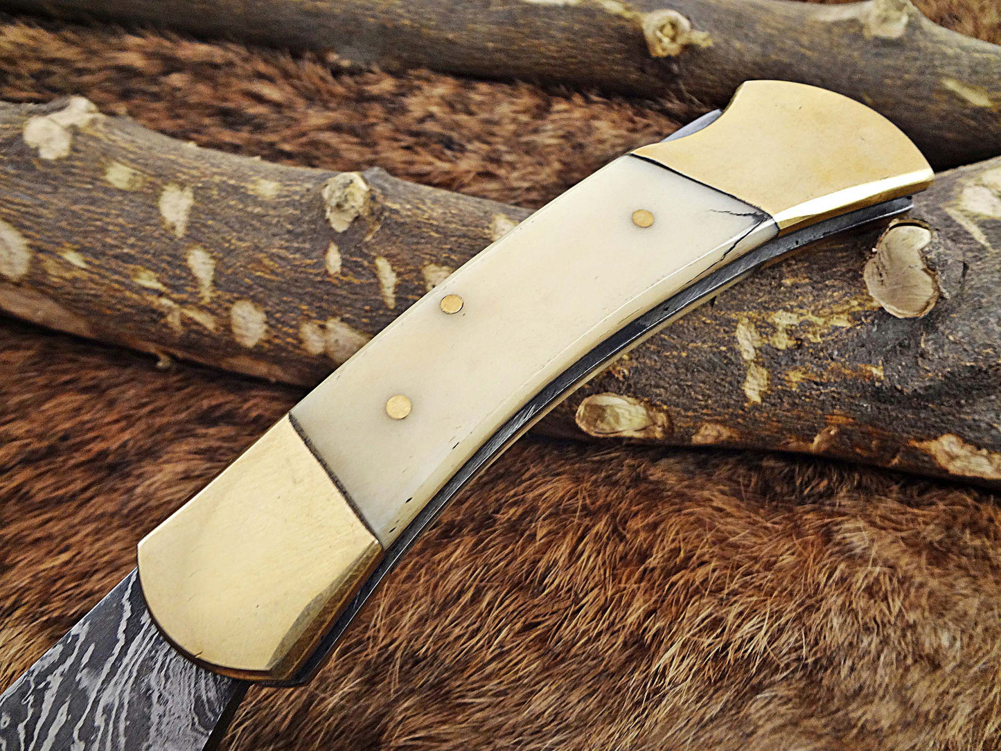 7.5" back liver lock Folding Knife, Hand forged Damascus steel blade, Available in wood, Bone and Horn scales bolster, Comes with cow hide leather sheath