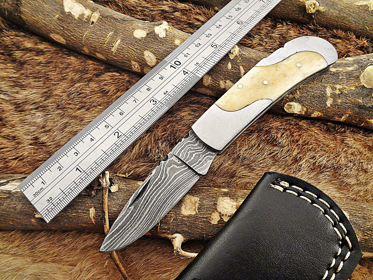 Damascus steel 6.5 " long Folding Knife, Various scales available with steel bolster, 3" Hand Forged blade,  Cow hide leather sheath included