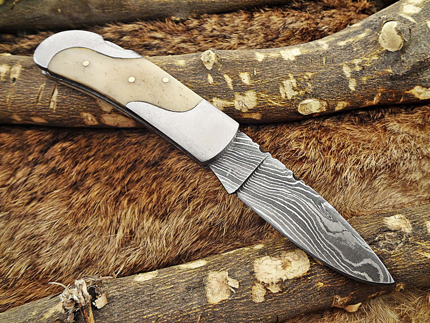 Damascus steel 6.5 " long Folding Knife, Various scales available with steel bolster, 3" Hand Forged blade,  Cow hide leather sheath included