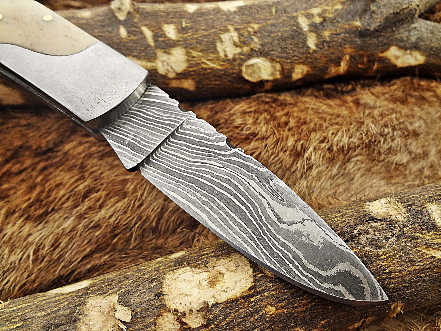 Damascus steel 6.5 " long Folding Knife, Various scales available with steel bolster, 3" Hand Forged blade,  Cow hide leather sheath included