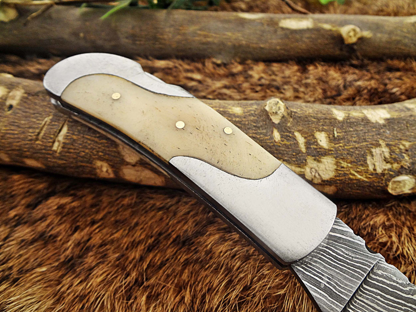 Damascus steel 6.5 " long Folding Knife, Various scales available with steel bolster, 3" Hand Forged blade,  Cow hide leather sheath included