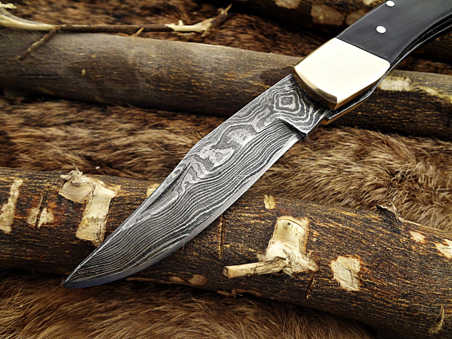 7.5" back liver lock Folding Knife, Hand forged Damascus steel blade, Available in wood, Bone and Horn scales bolster, Comes with cow hide leather sheath