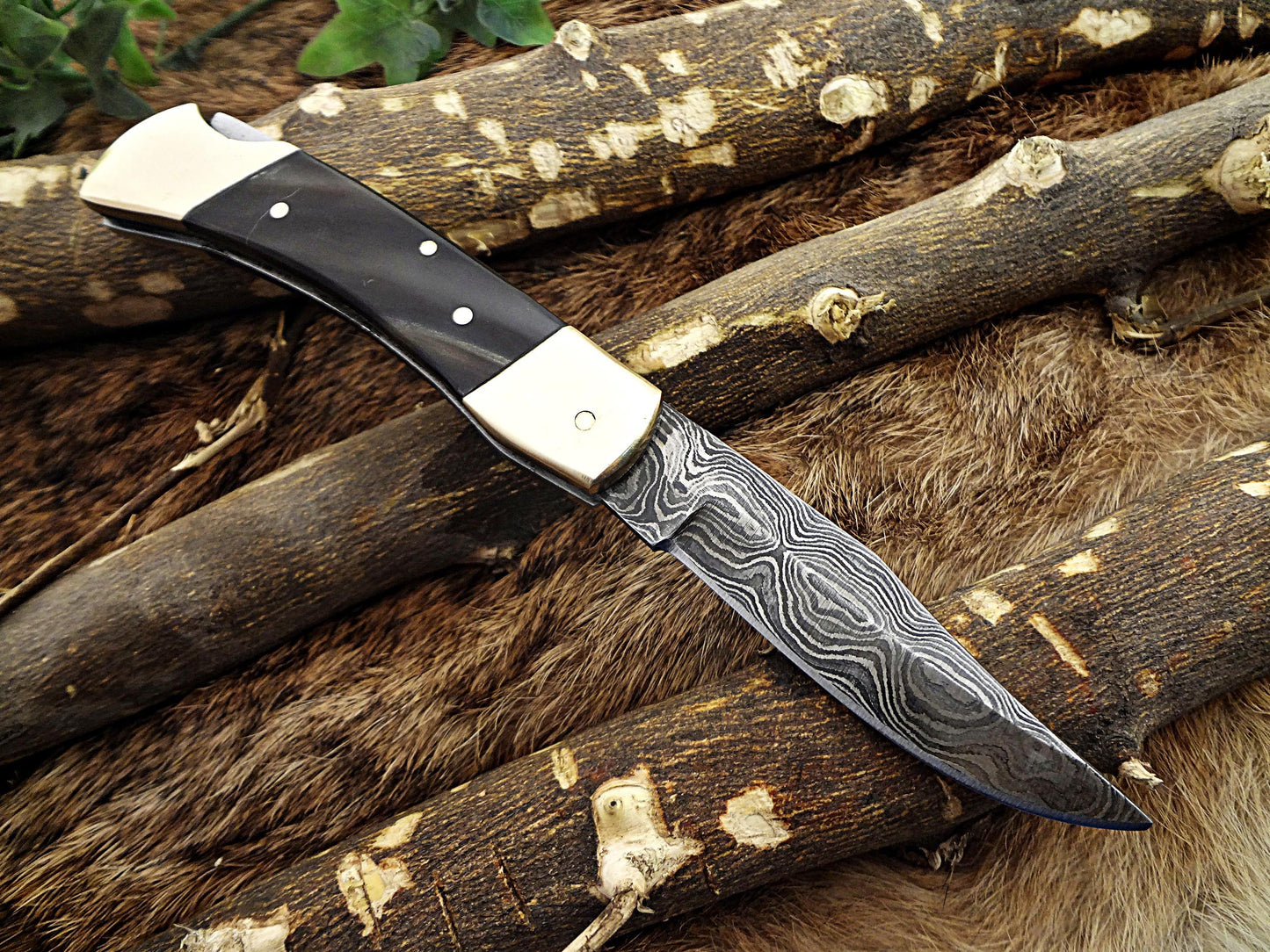 7.5" back liver lock Folding Knife, Hand forged Damascus steel blade, Available in wood, Bone and Horn scales bolster, Comes with cow hide leather sheath