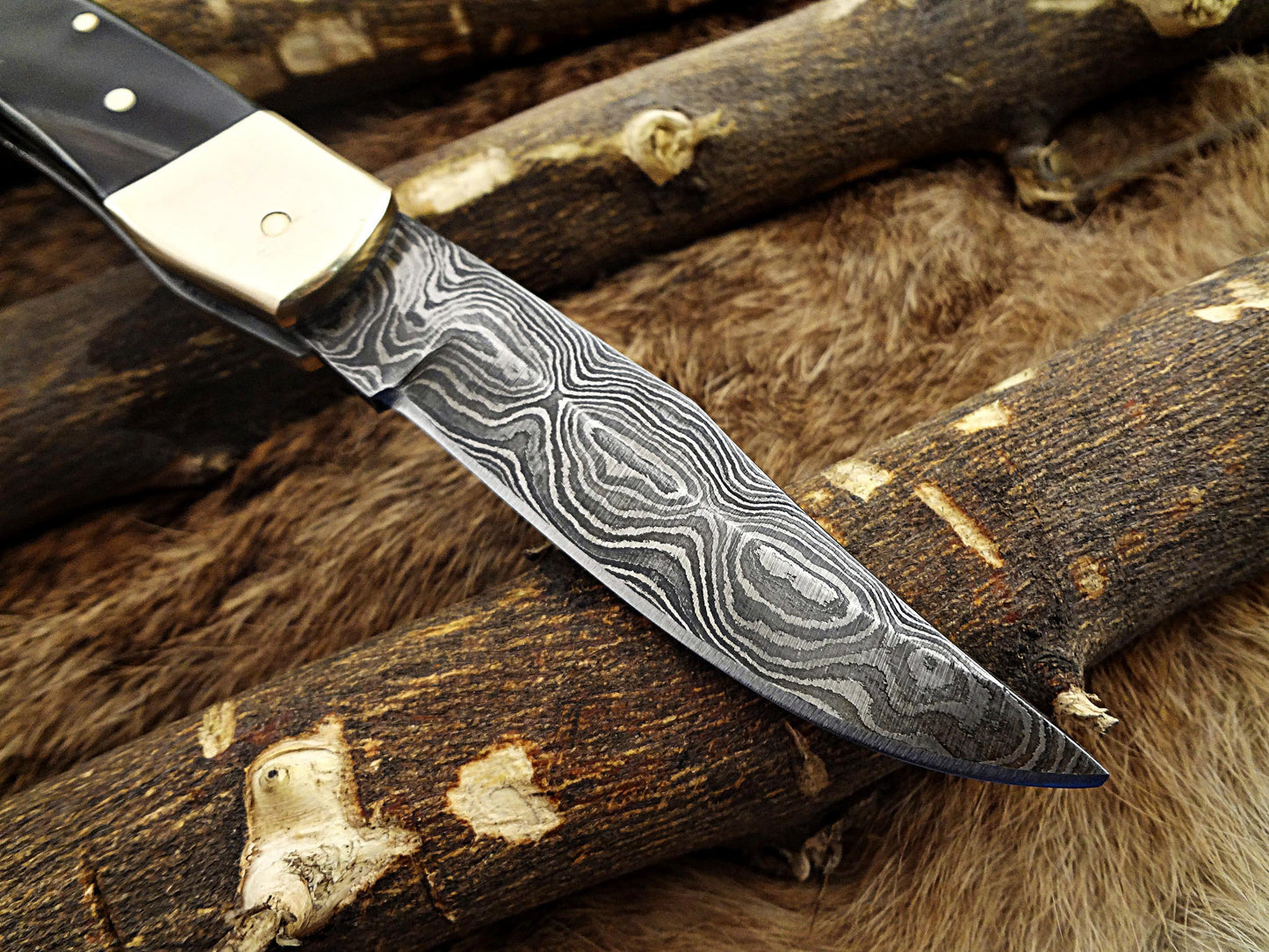 7.5" back liver lock Folding Knife, Hand forged Damascus steel blade, Available in wood, Bone and Horn scales bolster, Comes with cow hide leather sheath