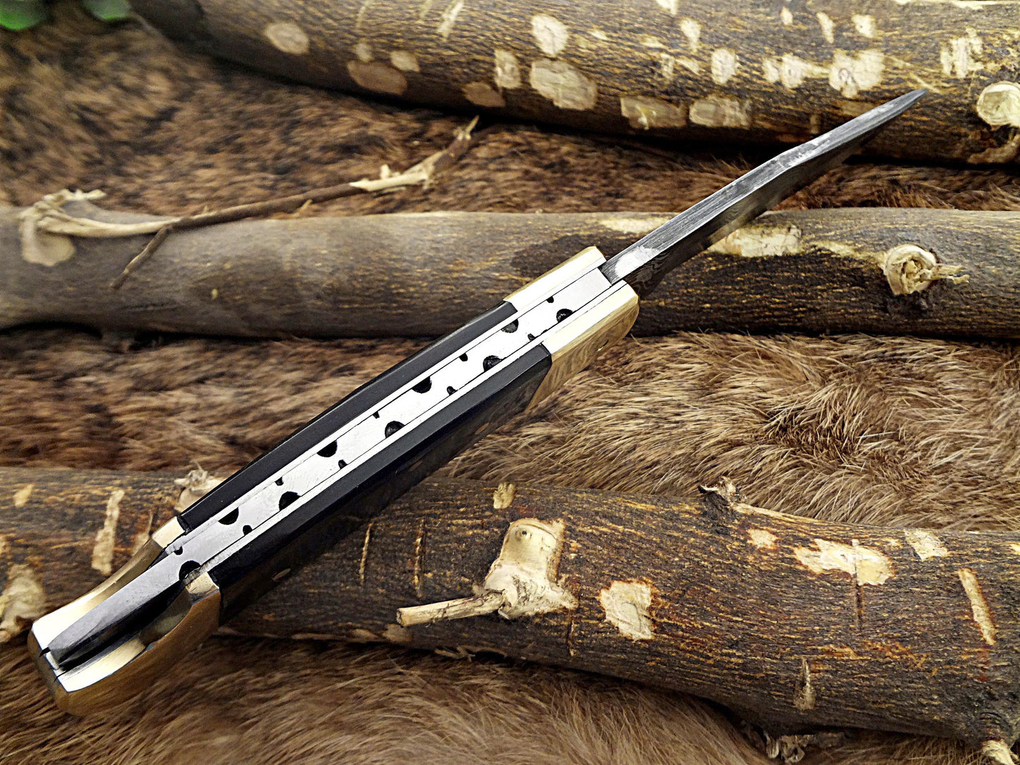 7.5" back liver lock Folding Knife, Hand forged Damascus steel blade, Available in wood, Bone and Horn scales bolster, Comes with cow hide leather sheath