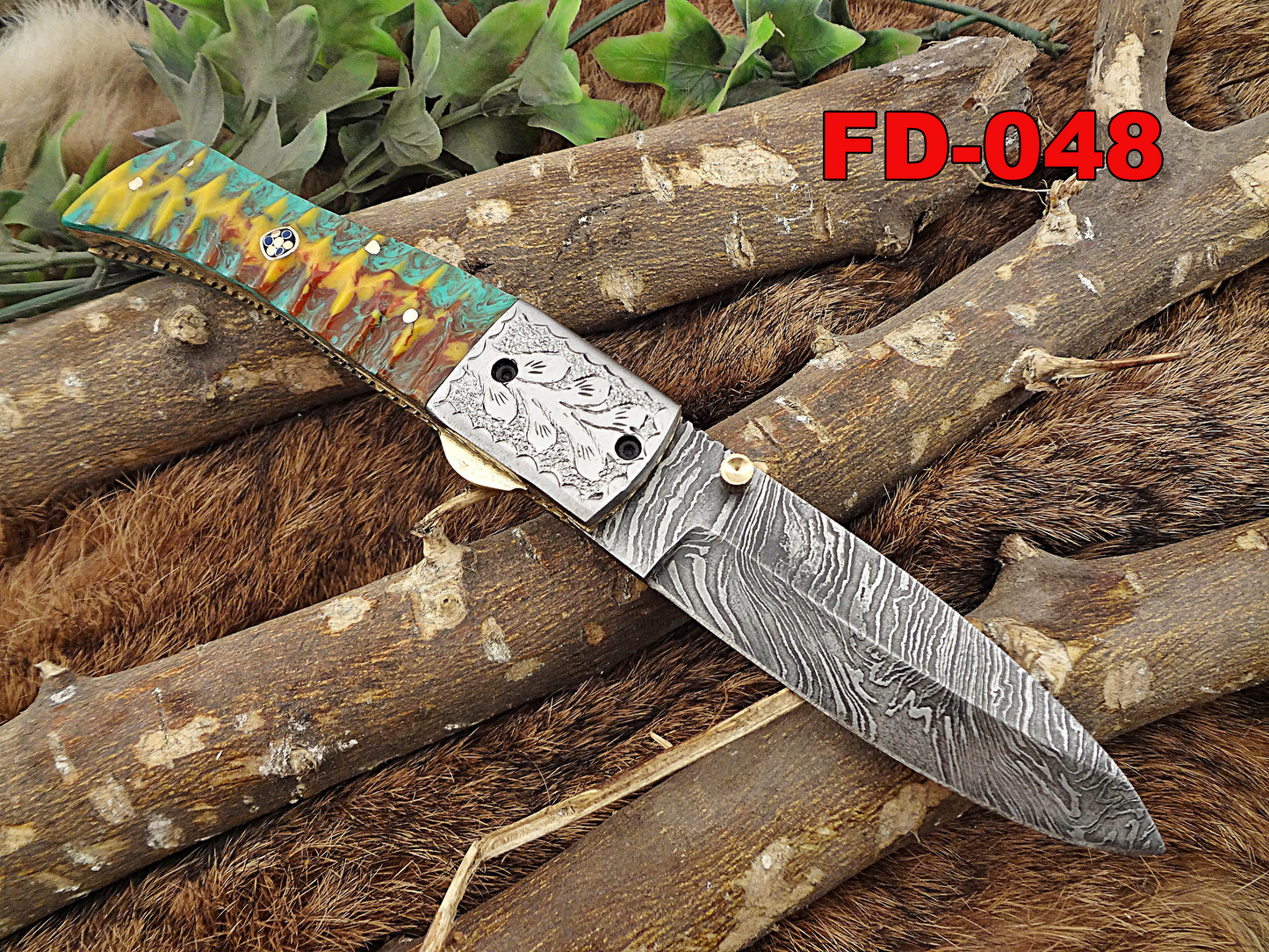 Damascus Steel Folding knife, Exotic Jigged scale in Camouflage & green combo, Engraved plant on steel bolster, Thumb knob & liner lock, Cow Leather sheath
