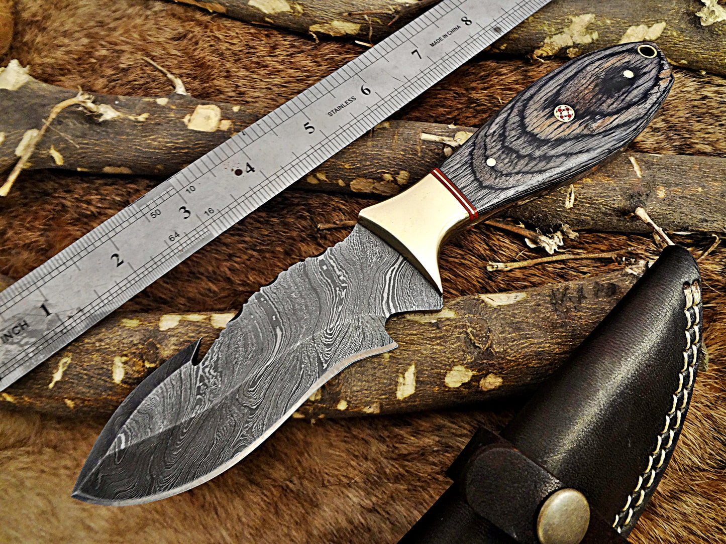 9" Long hand forged Damascus steel full tang skinning Knife with gut hook, Bull horn with Damascus Bolster, Cow hide Leather sheath
