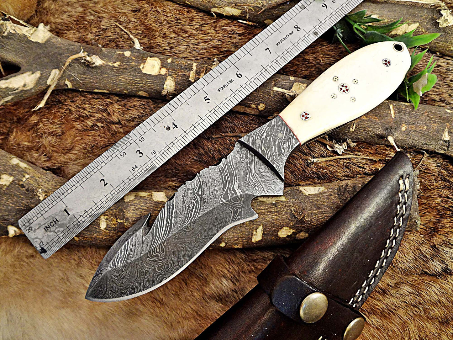 9" Long hand forged Damascus steel full tang skinning Knife with gut hook, Bull horn with Damascus Bolster, Cow hide Leather sheath