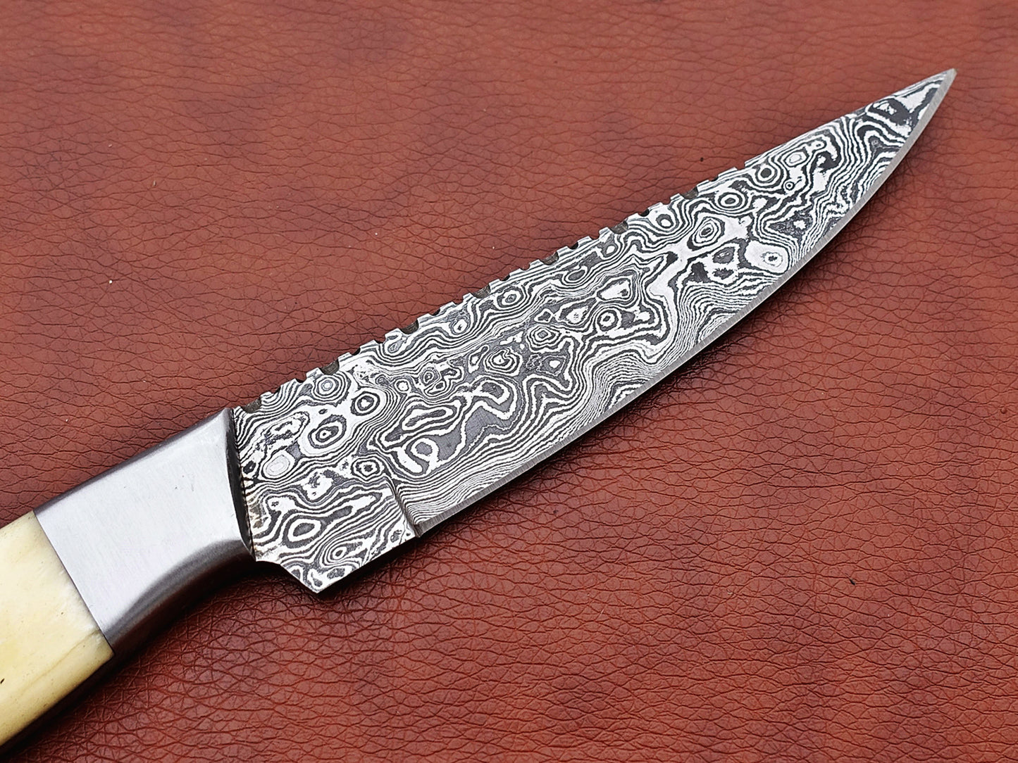 9.5" straight back blade skinning knife, 5" full tang Rain drop pattern Damascus steel blade, Available in 4 colors, includes Cow hide Leather sheath