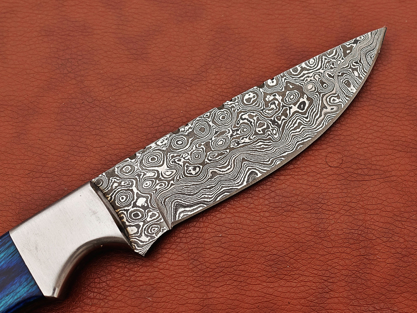 9.5" skinning knife, 5" full tang Rain drop pattern straight back Damascus steel blade, Available in 4 colors, includes Cow hide Leather sheath