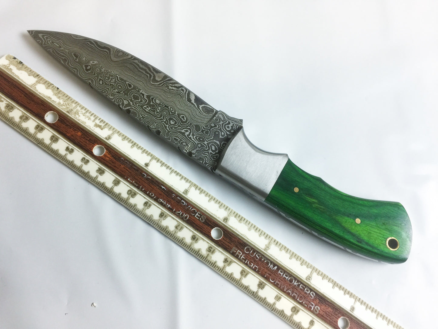 9.5" skinning knife, 5" full tang Rain drop pattern straight back Damascus steel blade, Available in 4 colors, includes Cow hide Leather sheath