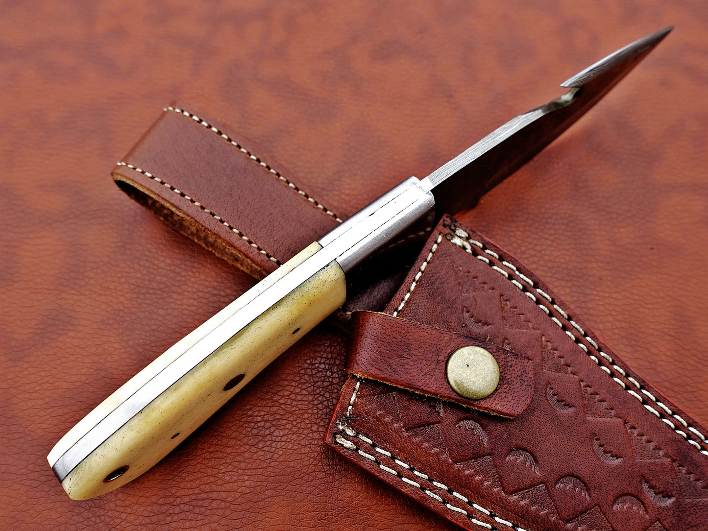 9.5" long Damascus steel Gut hook skinning knife, Full tang Rain drop pattern blade, available in 4 colors, includes Cow hide Leather sheath