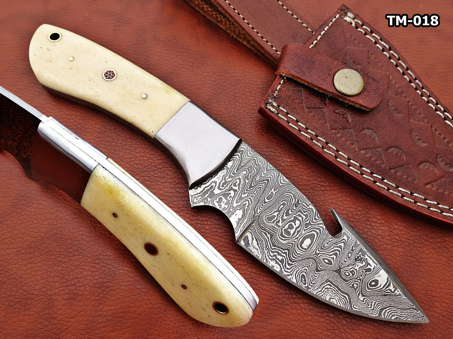 9.5" long Damascus steel Gut hook skinning knife, Full tang Rain drop pattern blade, available in 4 colors, includes Cow hide Leather sheath