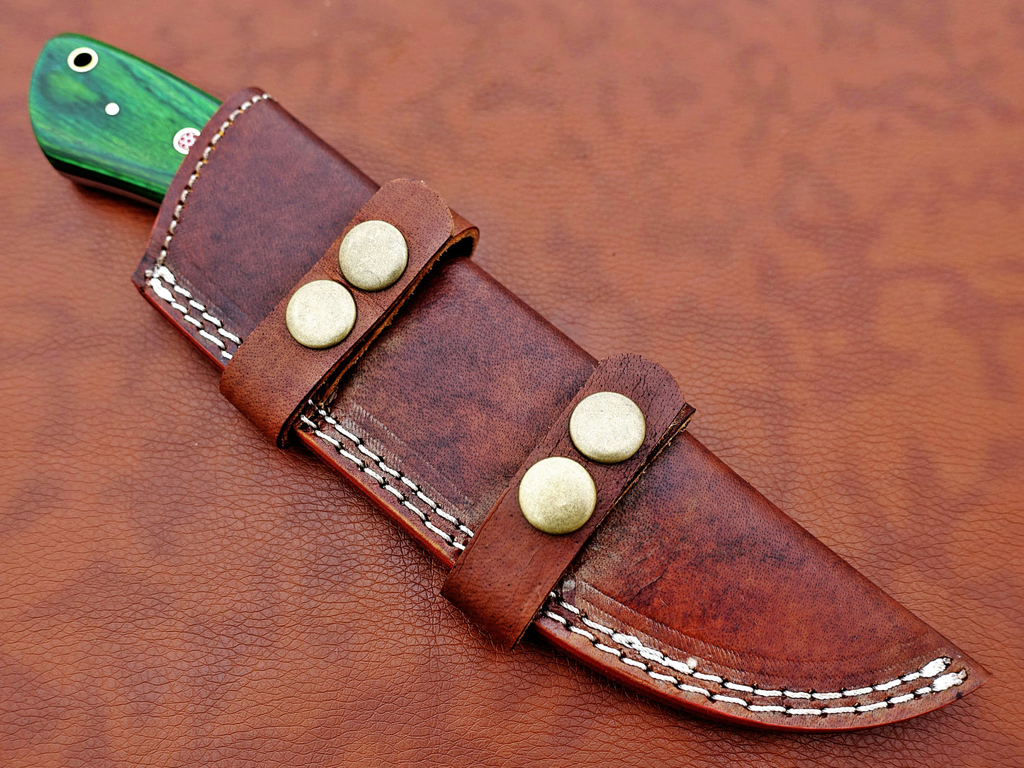 9.5" long Damascus steel Gut hook skinning knife, Full tang Rain drop pattern blade, available in 4 colors, includes Cow hide Leather sheath