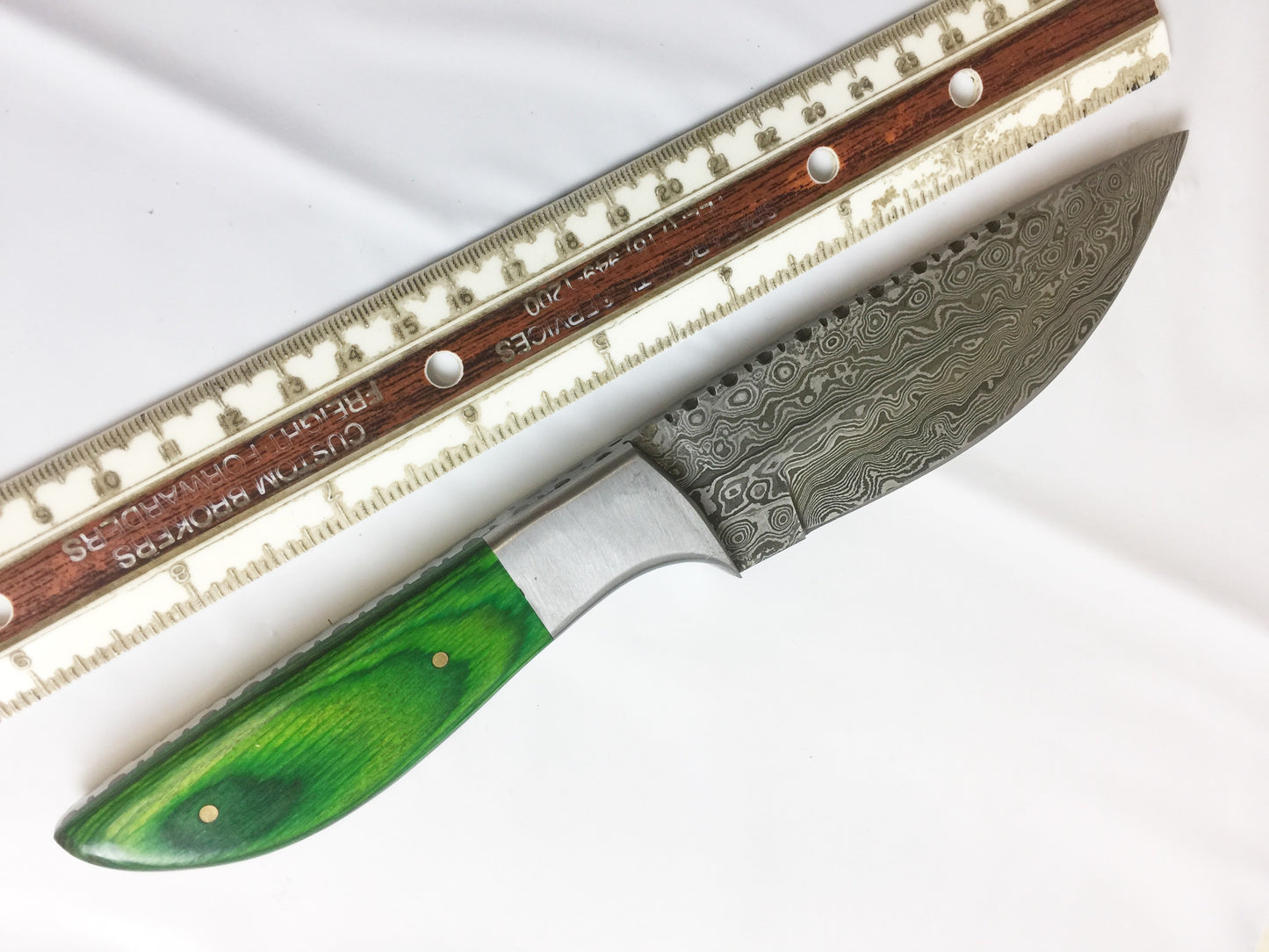 9.5" full tang Rain drop pattern skinning knife, 5" straight back Damascus steel blade, Available in 4 colors, includes Cow hide Leather sheath