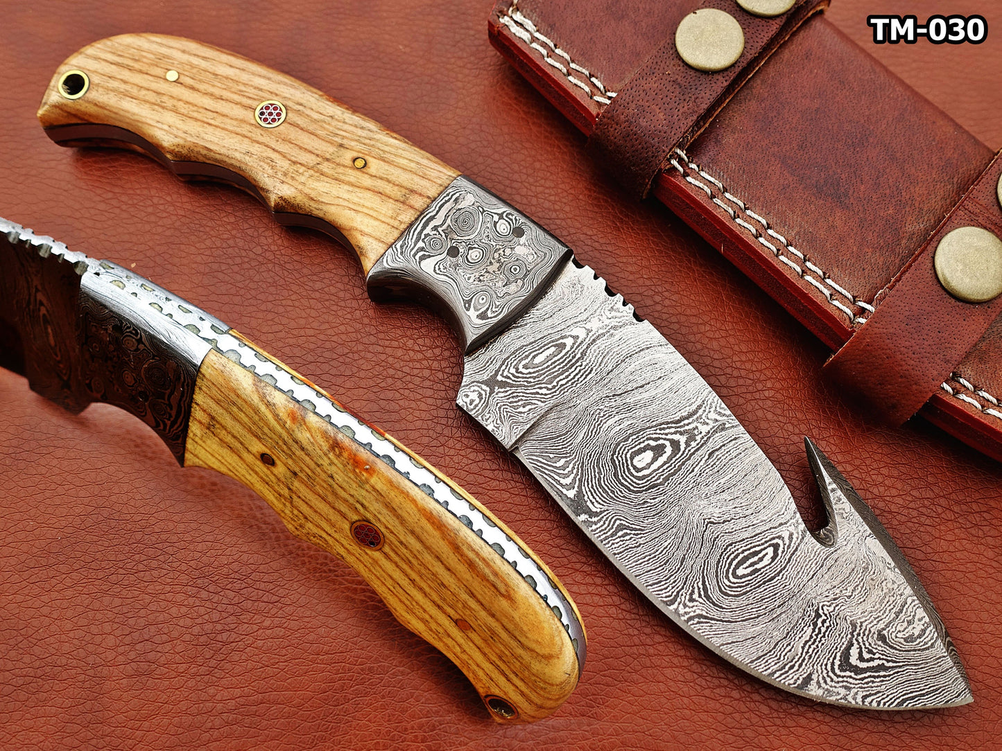 9.5" long Damascus steel Rain drop pattern Gut hook skinning knife, Full tang blade available in 4 colors, includes Cow hide Leather sheath