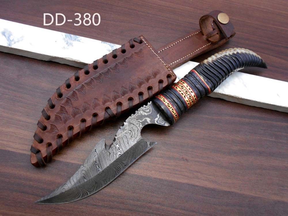13" Long hand forged Damascus steel gut hook Skinning Knife, Custom made Round engraved jigged scale Crafted with engraved Brass spacer, Cow hide Leather sheath
