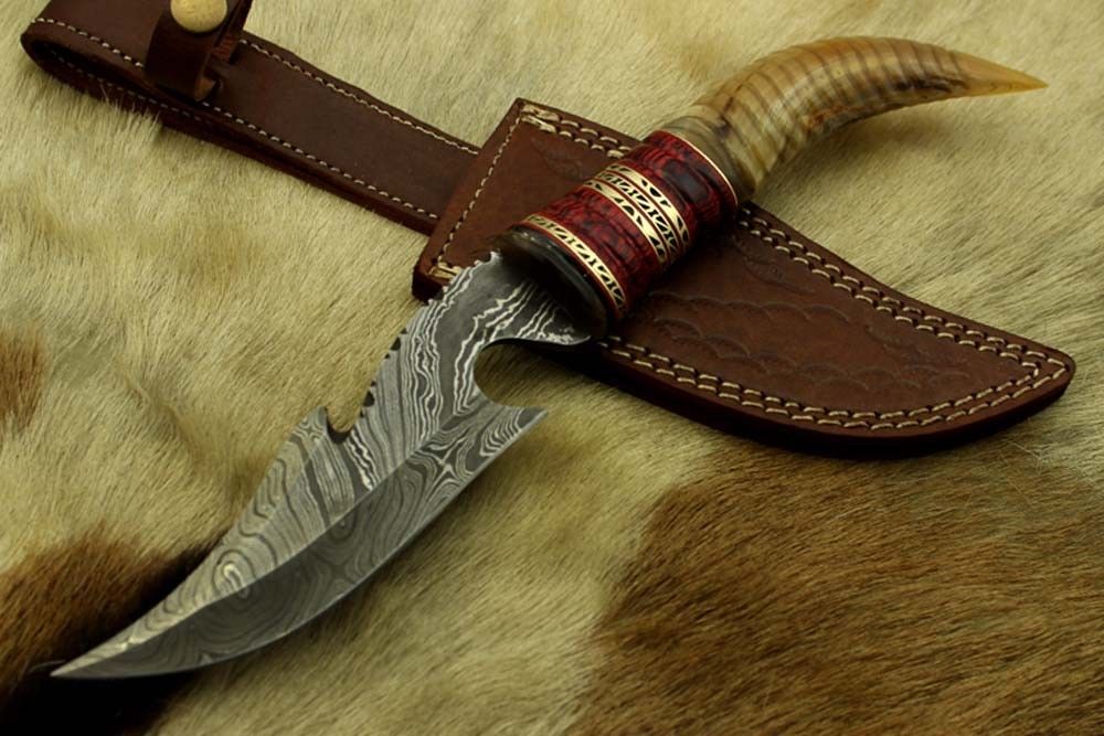 13" Long hand forged Damascus steel gut hook Skinning Knife, Custom made Round engraved jigged scale Crafted with engraved Brass spacer, Cow hide Leather sheath