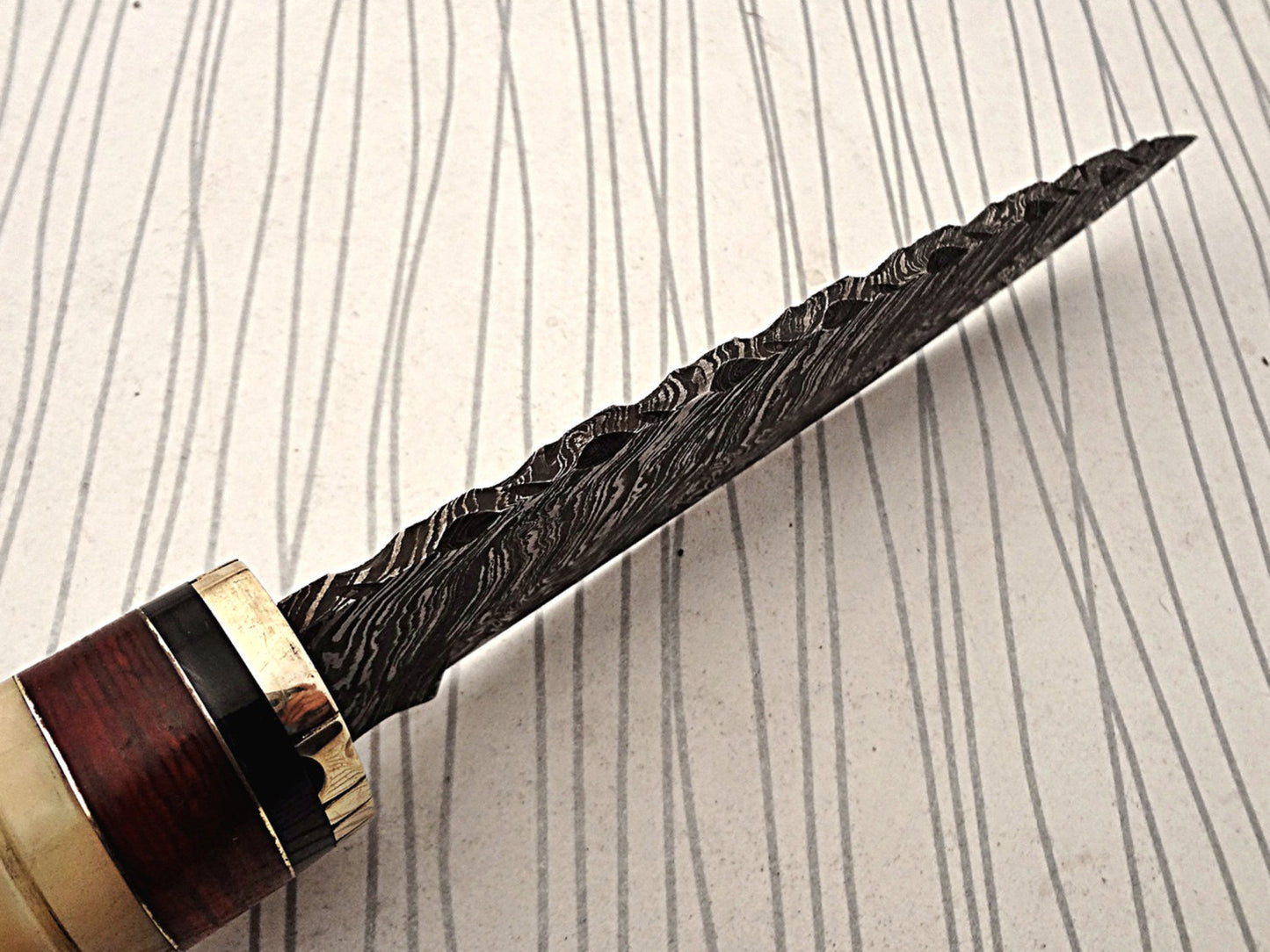 11" Long Damascus steel hunting Knife hand forged fire pattern, engraved Camel bone & brass round scale, thick Cow hide leather sheath