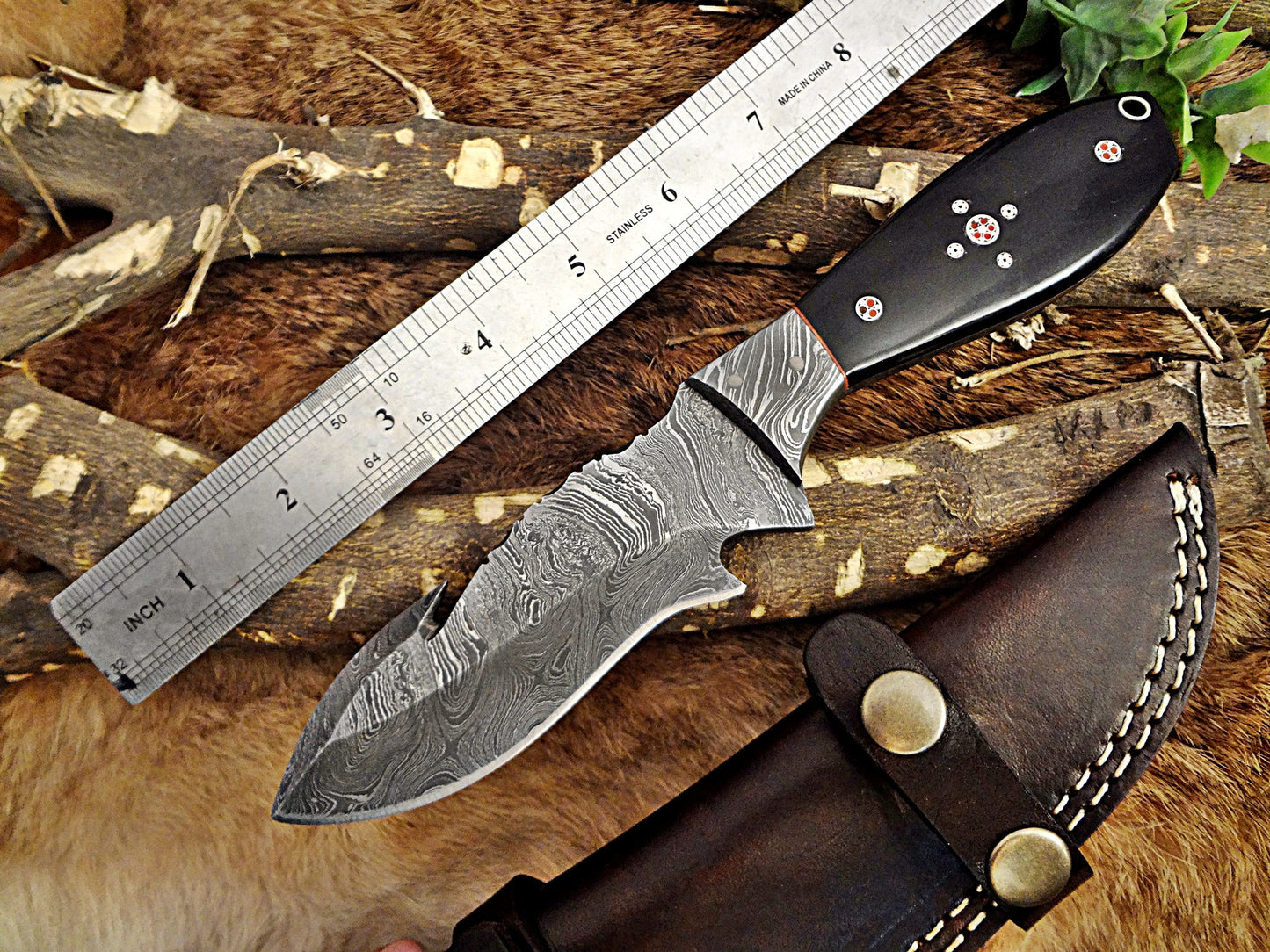 9" Long hand forged Damascus steel full tang skinning Knife with gut hook, Bull horn with Damascus Bolster, Cow hide Leather sheath
