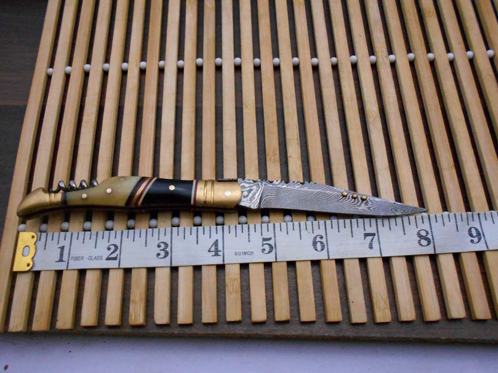 8 Inches long Damascus steel Hand Forged Folding Knife W/wine opener, Bull horn camel bone & brass scale, Cowleather sheath With loop