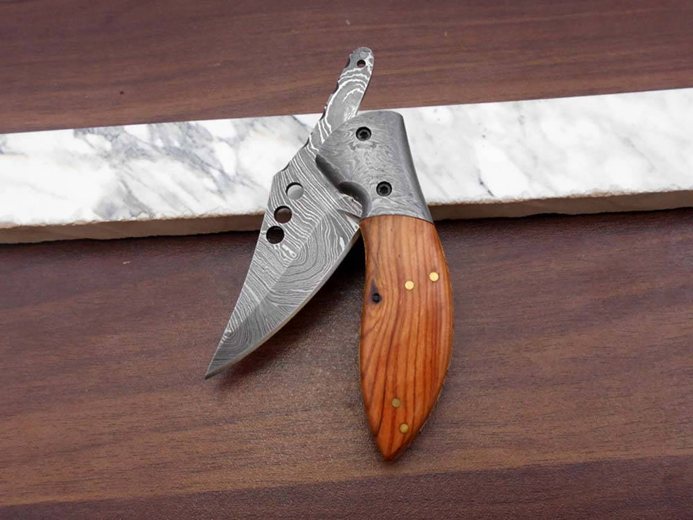 7" long Hand Forged Damascus steel blade Folding Knife, 1 hand opening , Rose wood & Damascus bolster scale, cow hide leather sheath