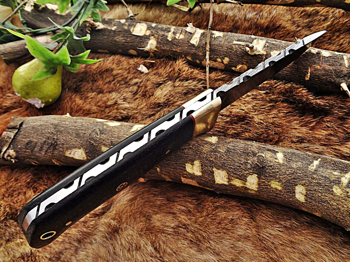 8.5" Long hand forged Damascus steel skinning knife, 4" full tang blade, Solid and 2 tone black scales available, Cow hide Leather sheath included