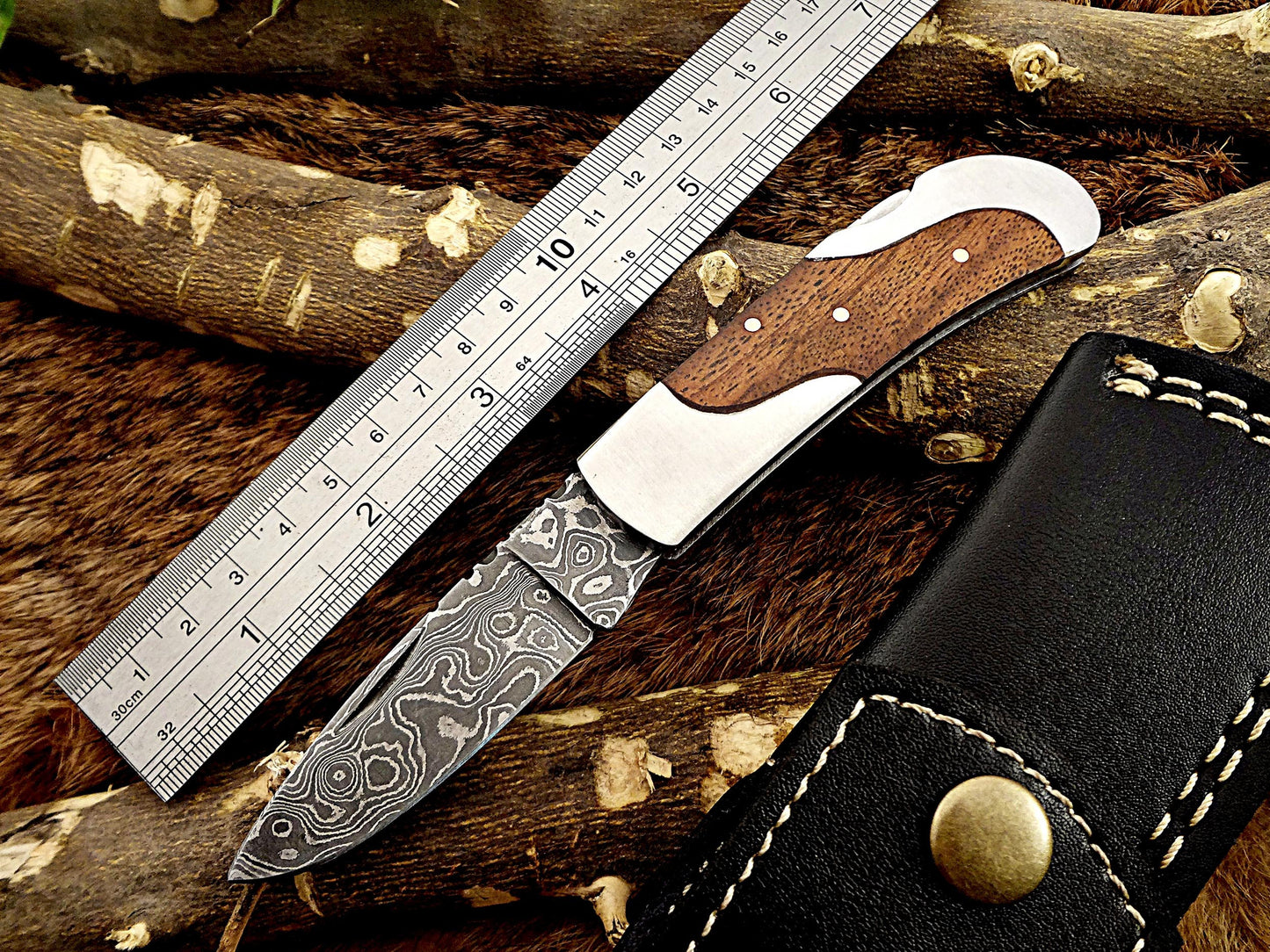 Damascus steel 6.5 " long Folding Knife, Various scales available with steel bolster, 3" Hand Forged blade,  Cow hide leather sheath included